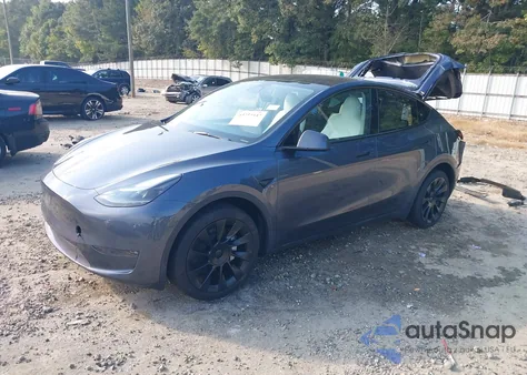 2023 Tesla Model Y Awd/Long Range Dual Motor All-Wheel Drive z USA, uszkodzony, nr VIN 7SAYGDEE4PA167984